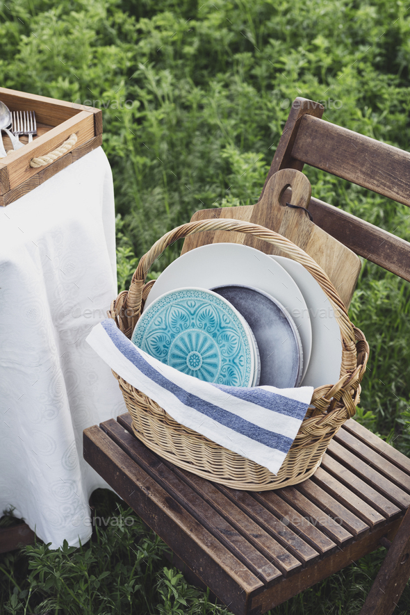 picnic basket with dishes Stock Photo by azgek PhotoDune